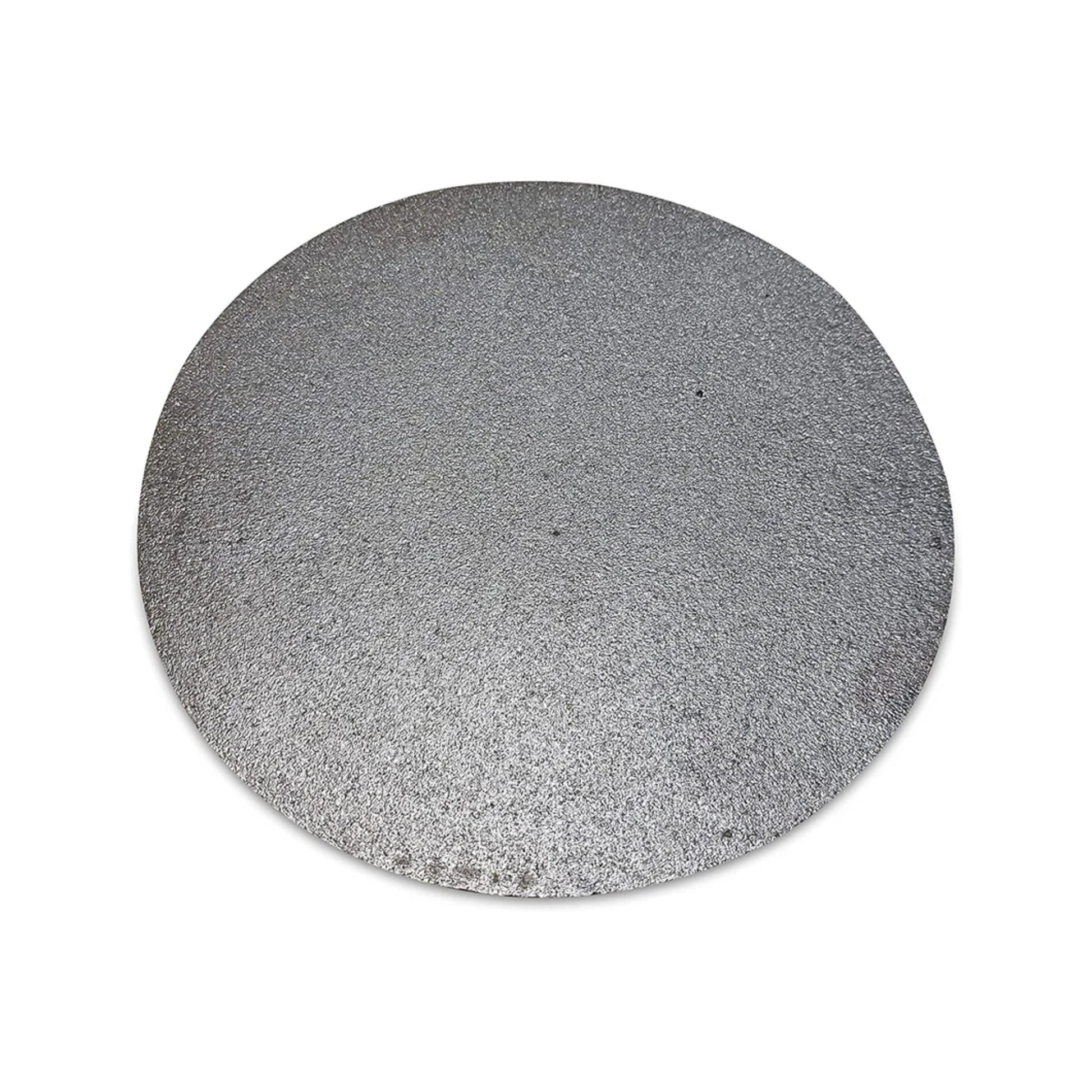 Round burger press in use - durable cast iron patty shaping tool