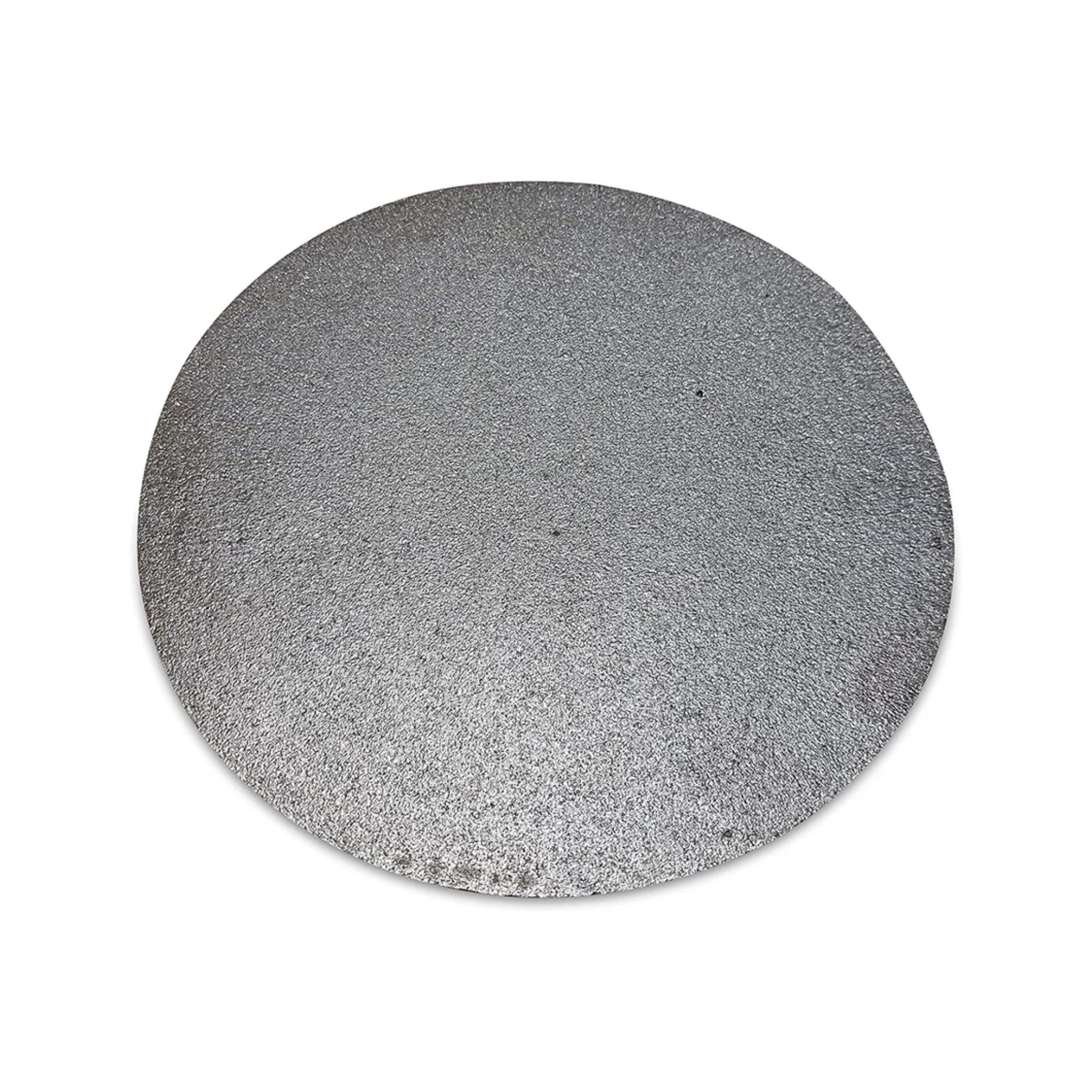 Round burger press in use - durable cast iron patty shaping tool